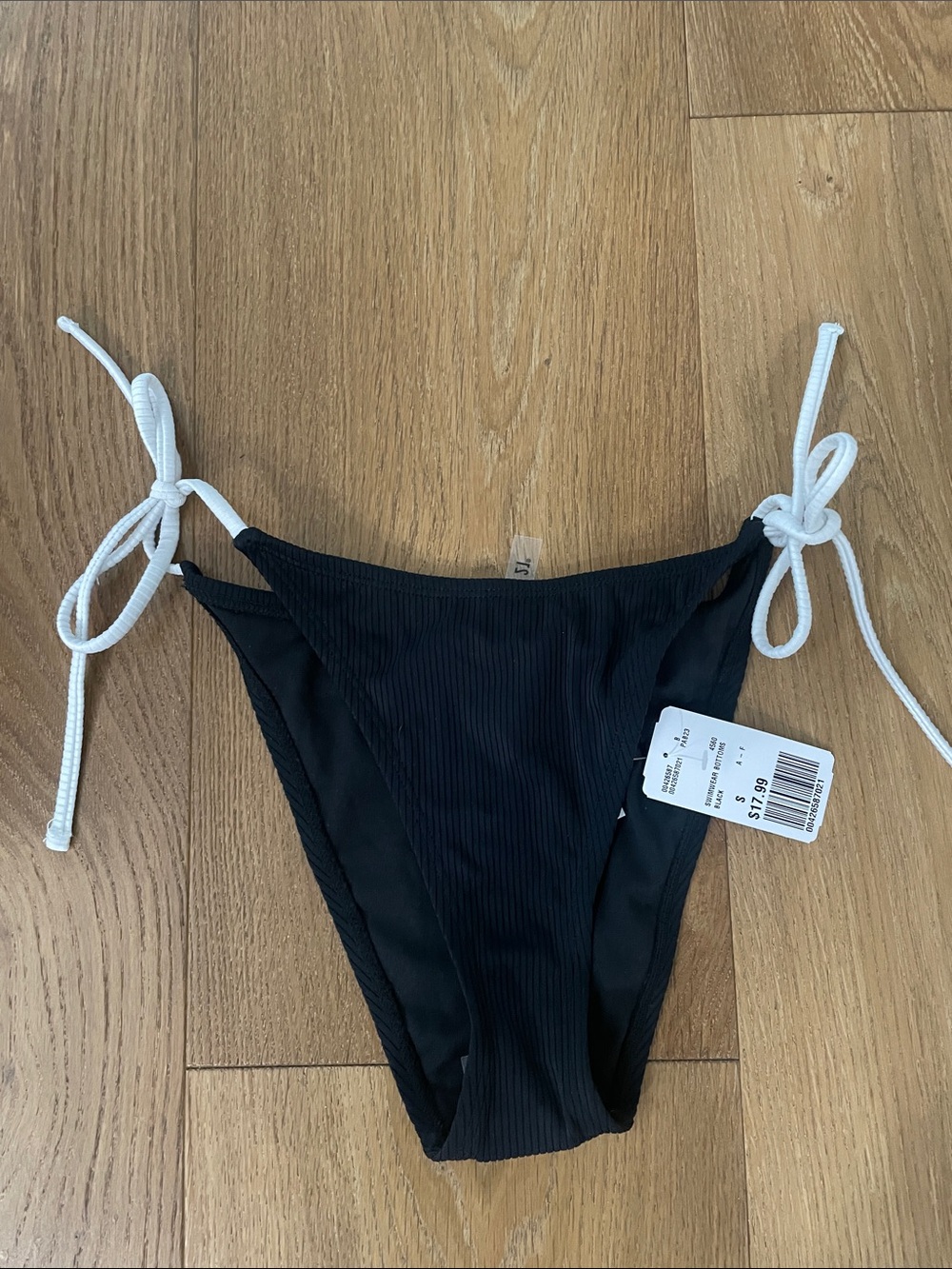 NWT forever, 21 black bikini bottoms with white string tie sides. Adorable!